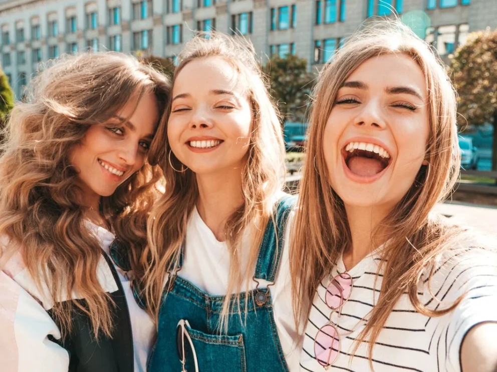 three young smiling hipster women summer clothes girls taking selfie self portrait photos smartphone models posing street female showing positive face emotions 158538 6798