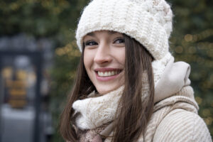 rsz portrait smiling woman outdoors with beanie