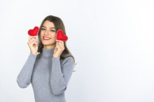 rsz 1young woman holding small hearts hands